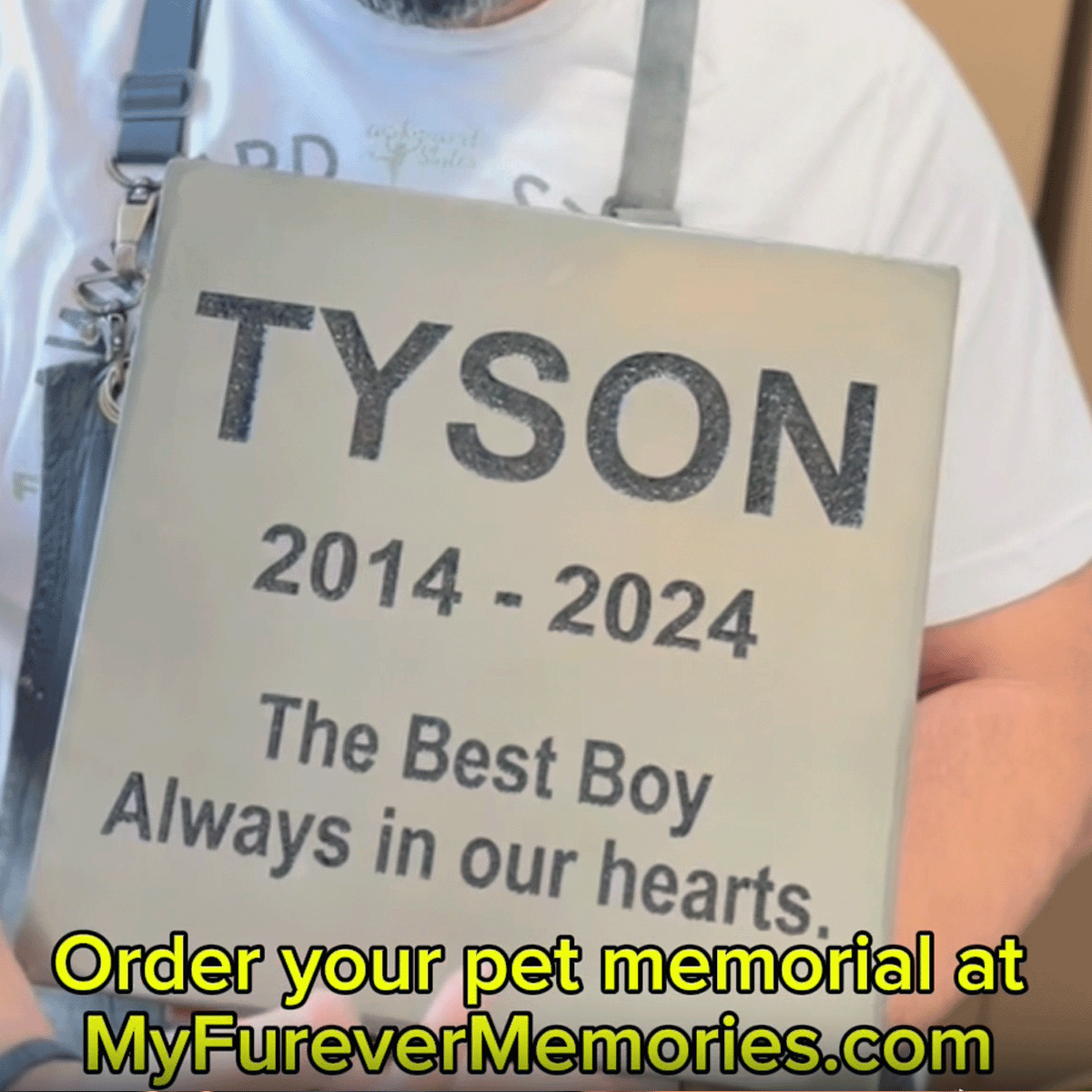A pet memorial being deeply sand carved into stone