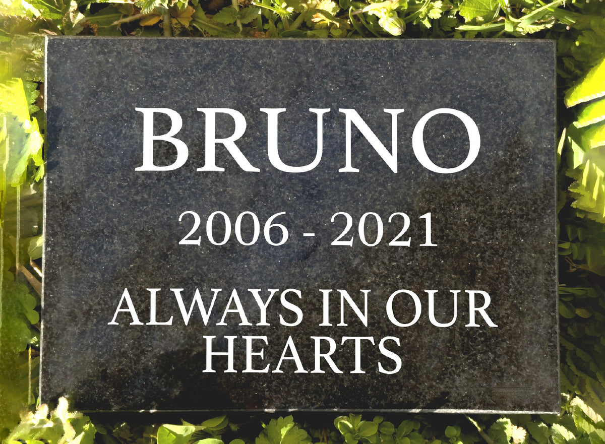 Personalized black granite pet memorial for Bruno with Always in Our Hearts inscription