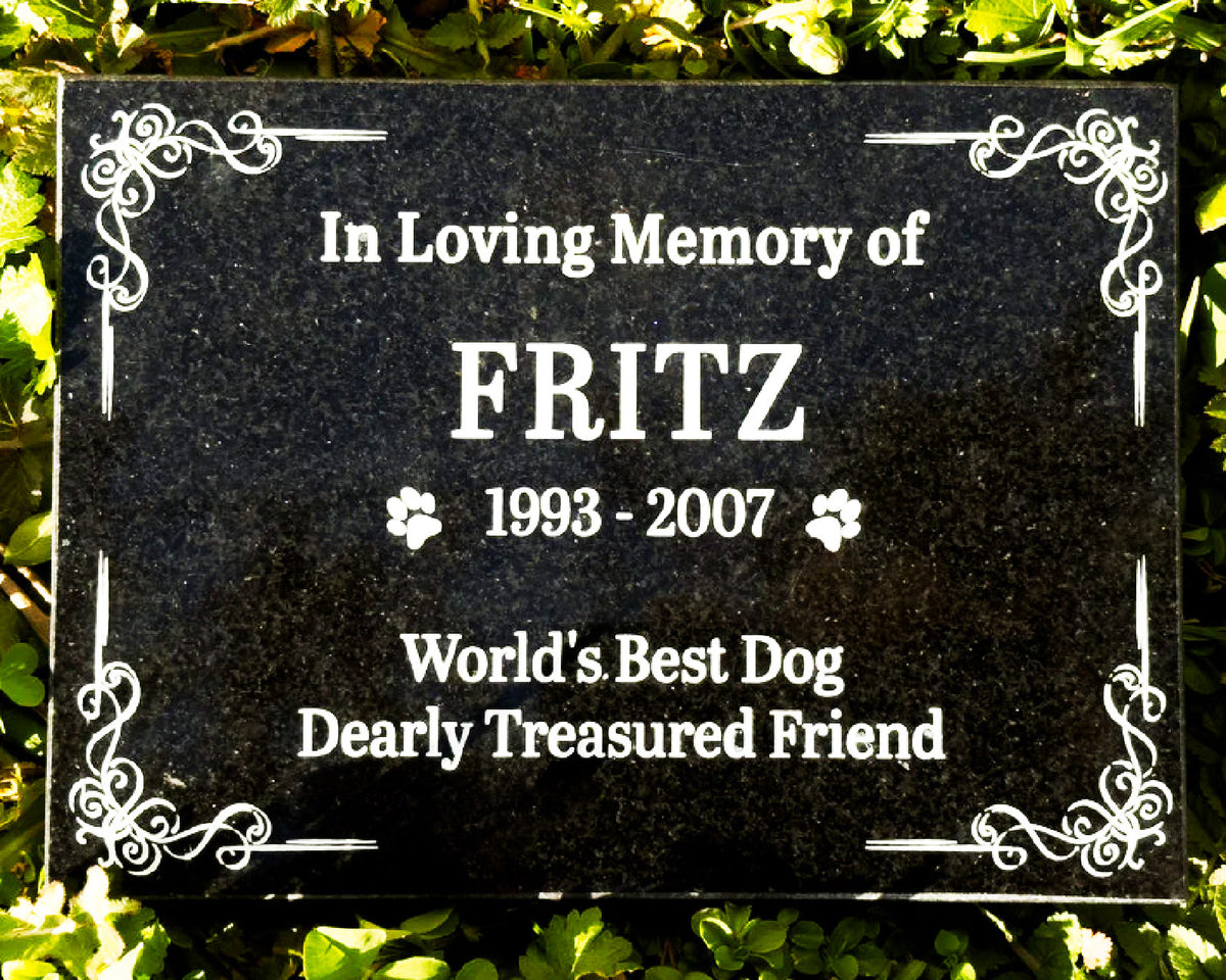 Black granite pet memorial with portrait and In Loving Memory inscription