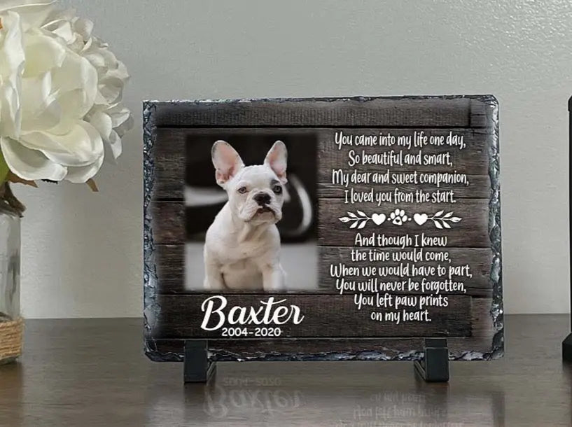 Small dog memorial photo slate for Baxter displayed on black stands